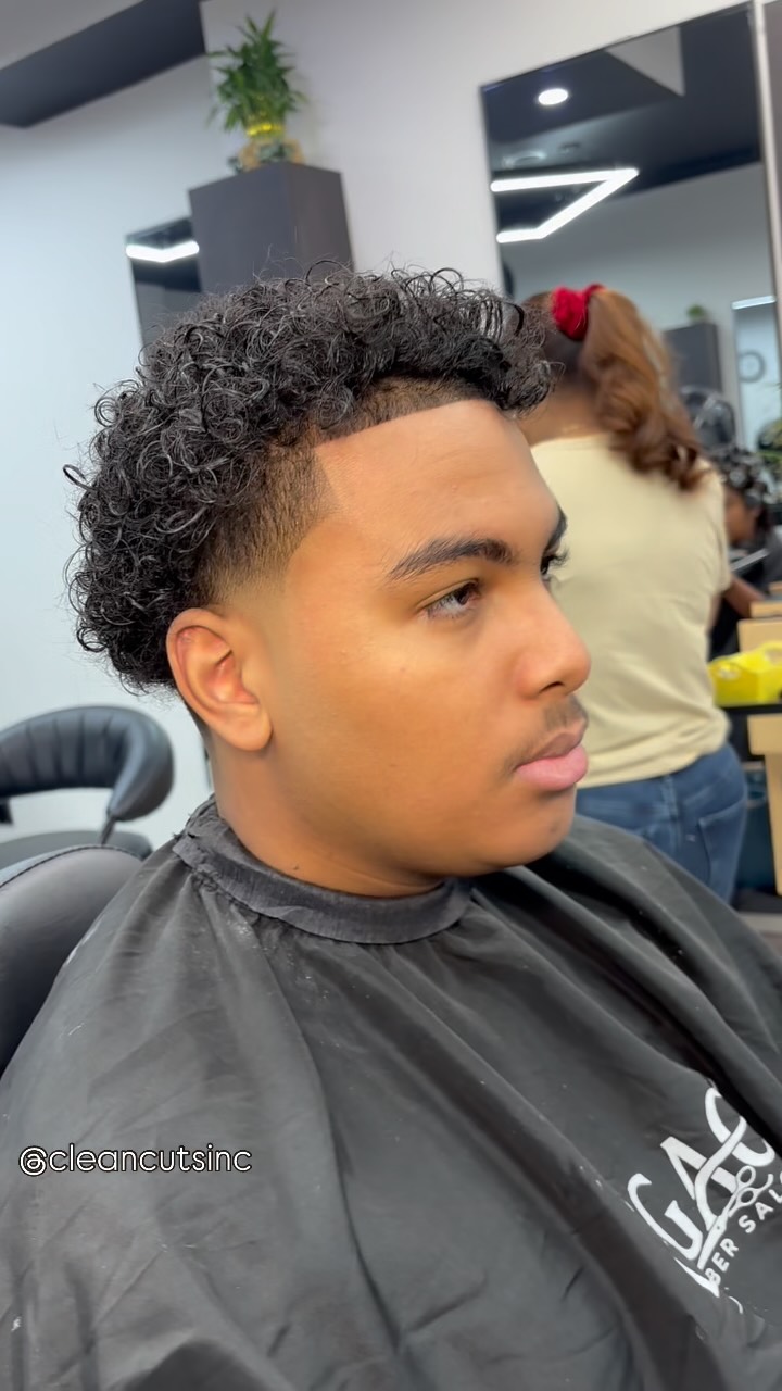 Curly top with sharp line-up at CleanCutsNYC, New York City